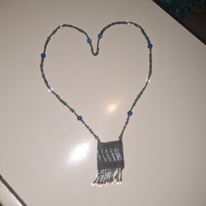 Beautifully hand Beaded "amulet"/necklace
